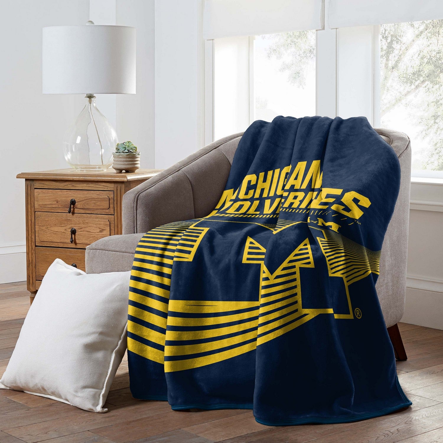 NCAA Raschel Throw Blanket Michigan Wolverines Couch